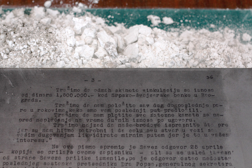Photography, engraving, steel, quicklime, office desk. Dimensions variable.