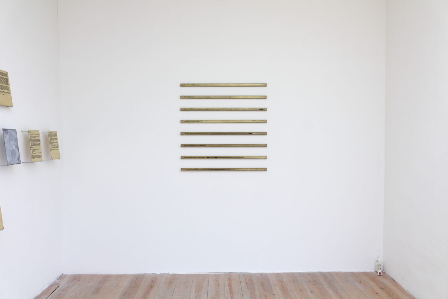 Installation - brass, lead, engraving, dimensions variable, 2015.